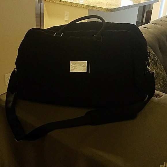 Vera Bradley Handbags - Over 5 pounds. Travel carry on bag.